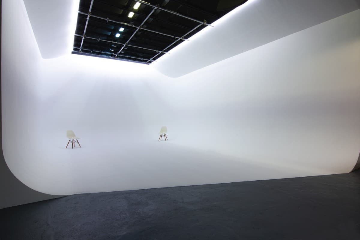 CTRL Stratford white cyclorama video podcast studio with overhead lighting in Newham E15
